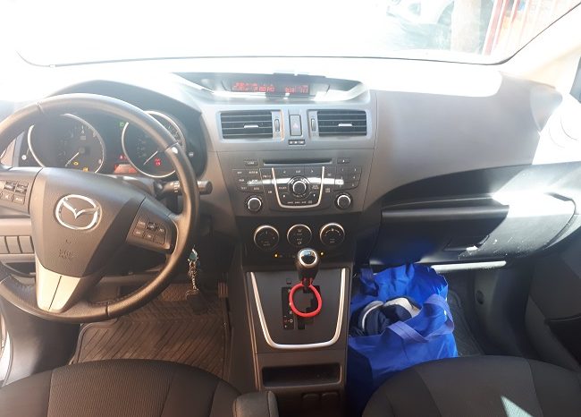 
								Mazda 5V Aut. 3ra corrida de asiento full									